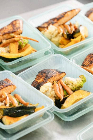 A salmon and veggie dish prepared by Superfine Kitchen